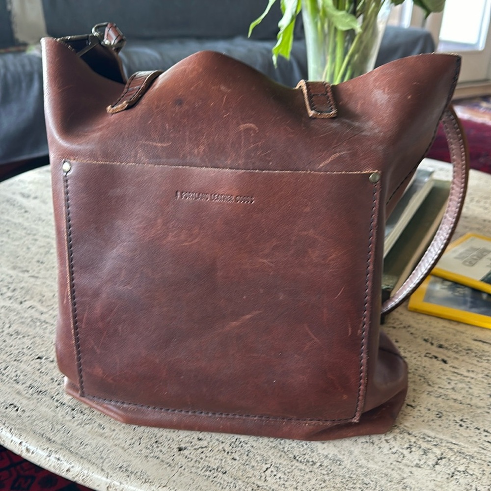 Portland leather Crossbody tote in cognac. Very well loved